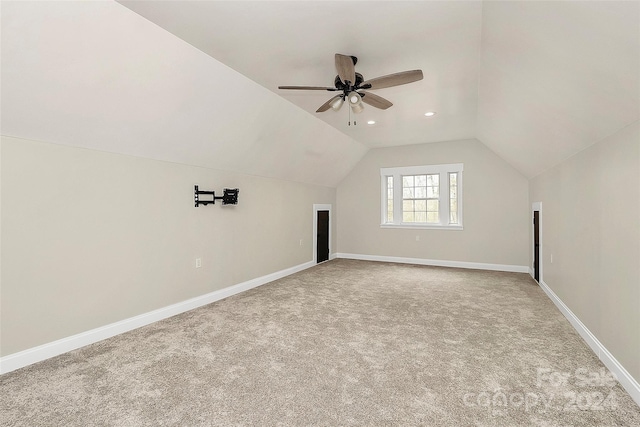 bonus room featuring carpet, ceiling fan, and vaulted ceiling