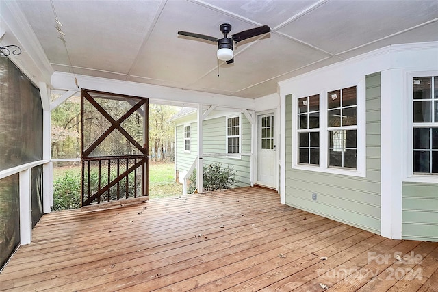 wooden deck with ceiling fan