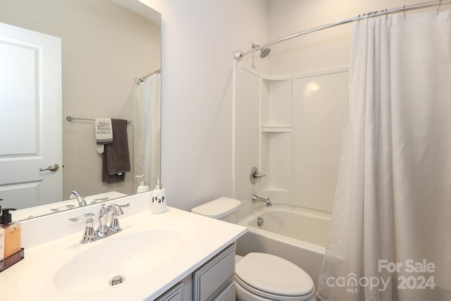 full bathroom featuring vanity, toilet, and shower / bathtub combination with curtain