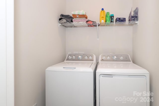 washroom featuring independent washer and dryer