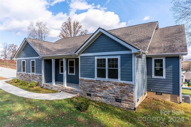 craftsman-style house with cooling unit