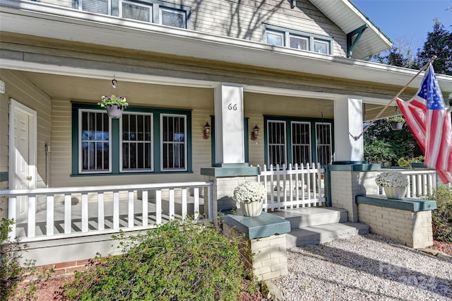 entrance to property with a porch