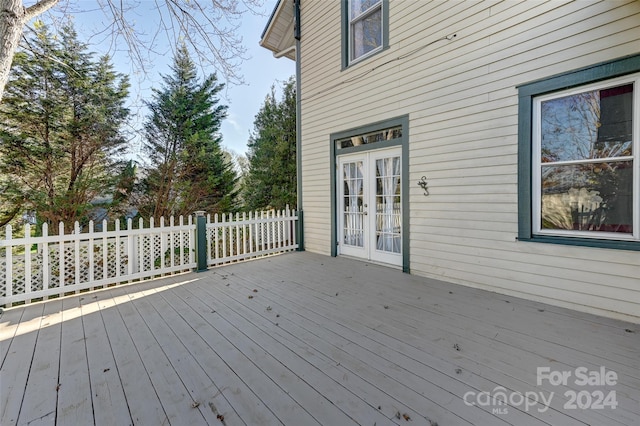 wooden terrace featuring french doors