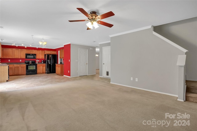 unfurnished living room featuring ornamental molding, ceiling fan with notable chandelier, and light colored carpet