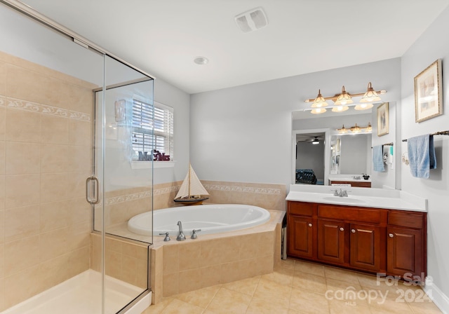 bathroom with shower with separate bathtub, vanity, tile patterned floors, and ceiling fan