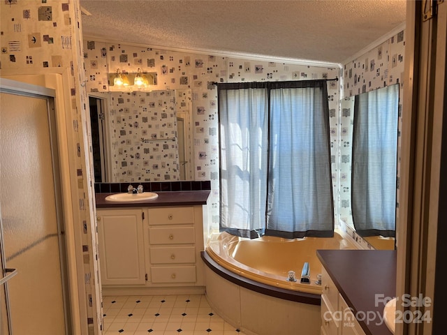 bathroom featuring vanity, lofted ceiling, ornamental molding, shower with separate bathtub, and a textured ceiling