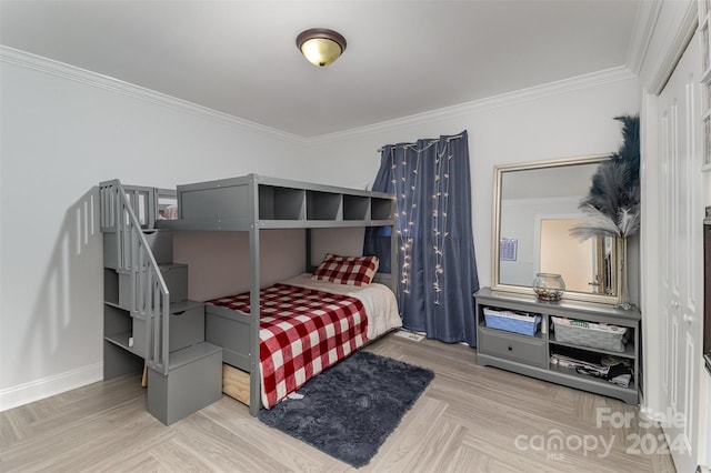 bedroom featuring parquet floors and crown molding