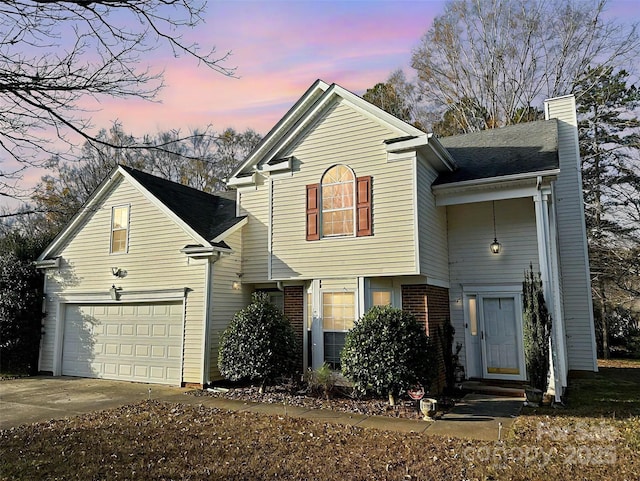 view of property featuring a garage