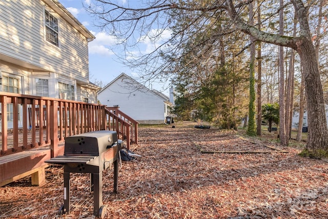 view of yard featuring a deck