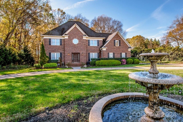 view of front of property featuring a front yard