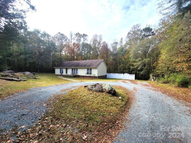 view of front of home featuring a front lawn