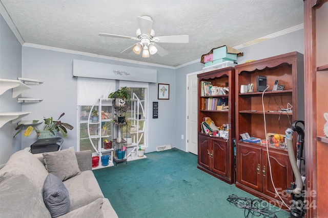 sitting room featuring ceiling fan, carpet flooring, and ornamental molding