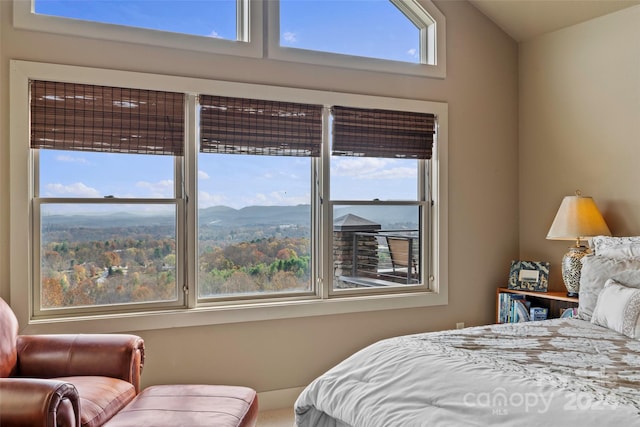 bedroom with a mountain view