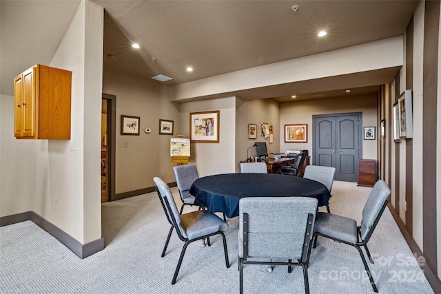 view of carpeted dining area