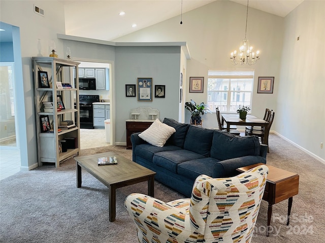 living room featuring high vaulted ceiling, light colored carpet, and a chandelier