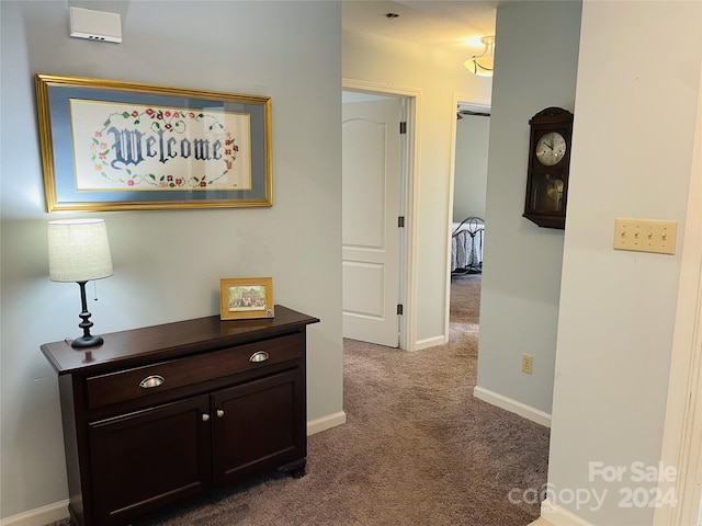 hallway with carpet