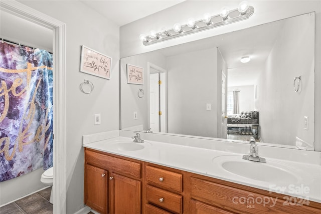 full bathroom with tile patterned flooring, vanity, toilet, and shower / tub combo with curtain