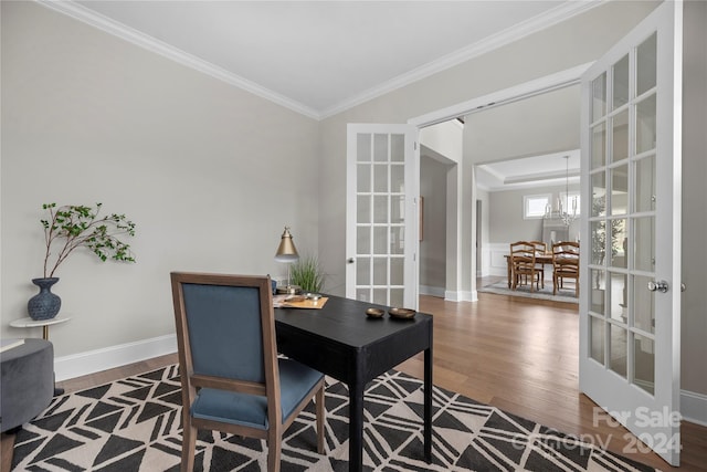 office area featuring ornamental molding, french doors, dark hardwood / wood-style flooring, and a chandelier