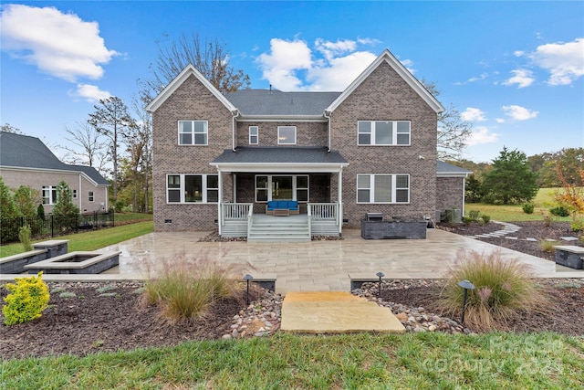 craftsman-style home with a patio