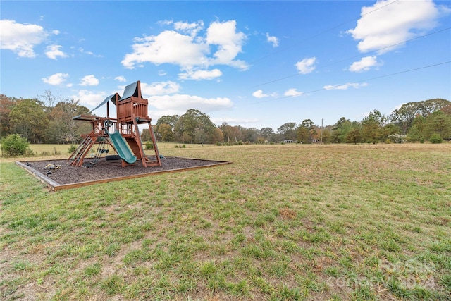 view of jungle gym featuring a yard