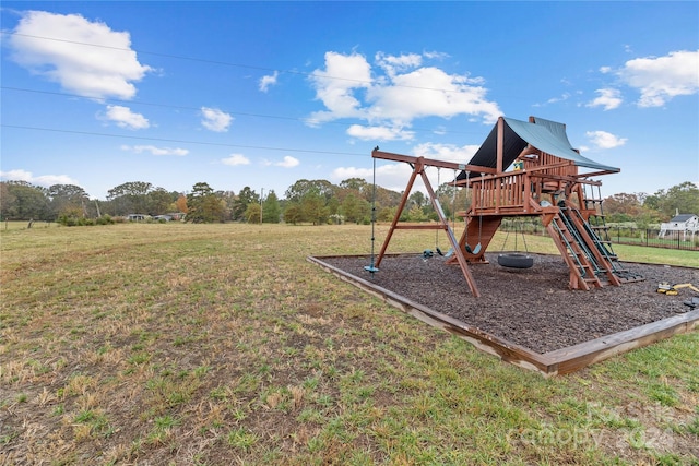 view of jungle gym featuring a lawn