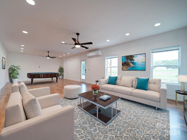 living room featuring ceiling fan, a wall mounted AC, billiards, and wood-type flooring