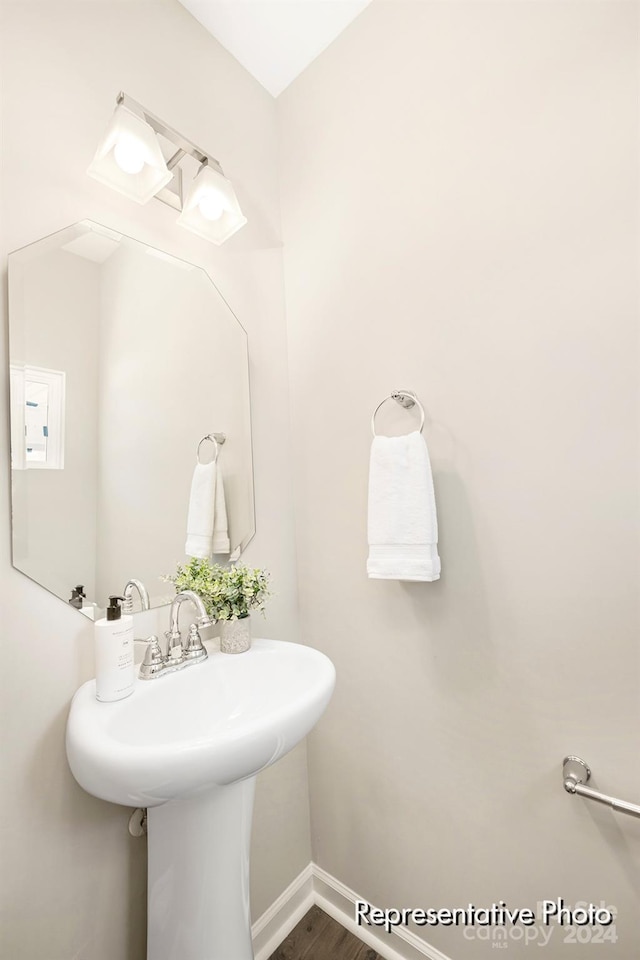 bathroom featuring hardwood / wood-style flooring