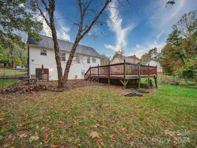 view of yard featuring a wooden deck