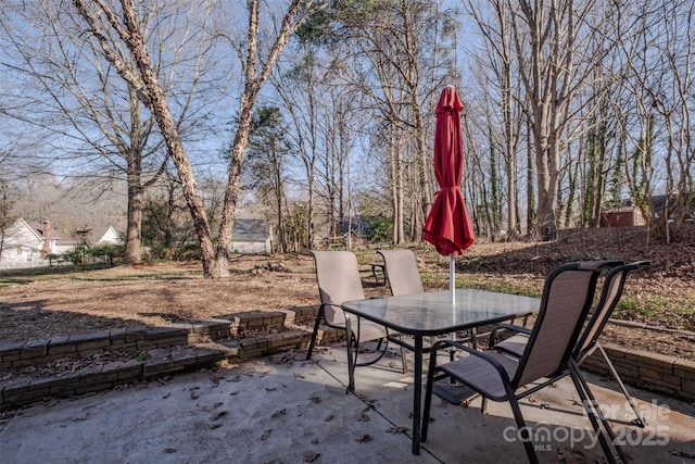 view of patio featuring outdoor dining space