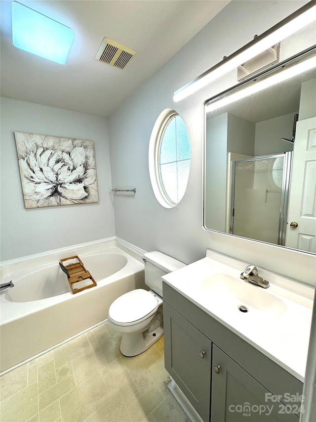 full bathroom with vanity, toilet, and shower with separate bathtub