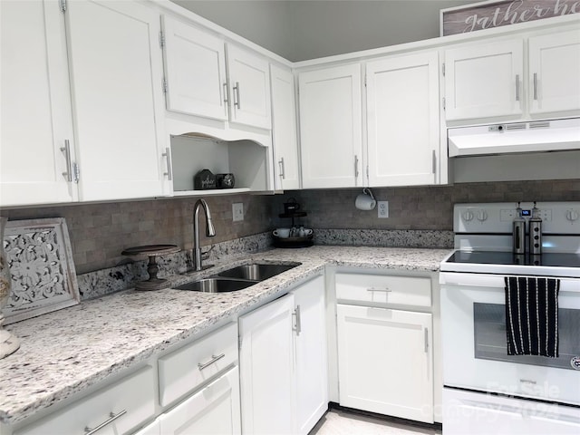 kitchen featuring white cabinetry, electric stove, sink, and backsplash