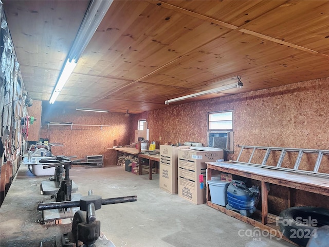 basement with a workshop area