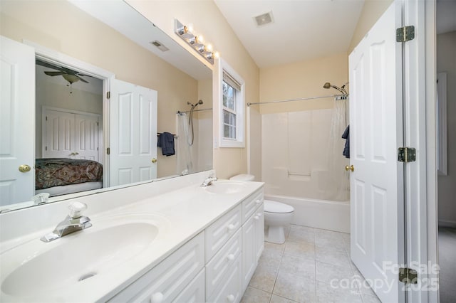 full bathroom featuring toilet, shower / tub combination, tile patterned floors, and vanity