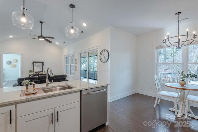 kitchen with white cabinetry, stainless steel dishwasher, light stone counters, and sink