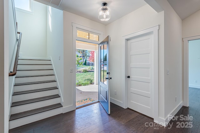 entryway featuring dark wood-type flooring