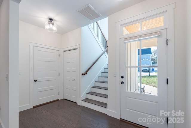 entrance foyer featuring dark wood-type flooring