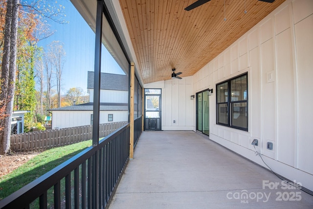 exterior space featuring ceiling fan