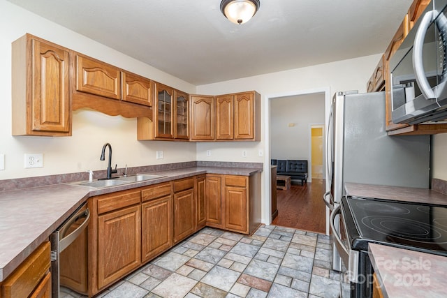 kitchen featuring sink and appliances with stainless steel finishes