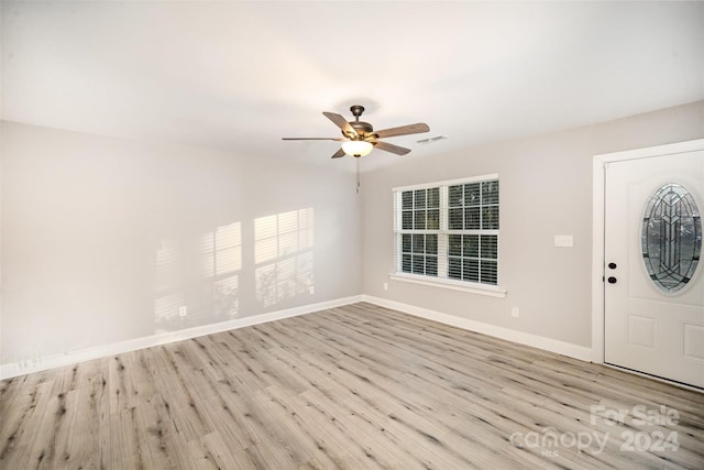 foyer featuring ceiling fan and light wood-type flooring