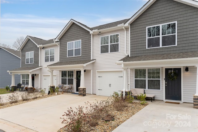 view of front of home with a garage