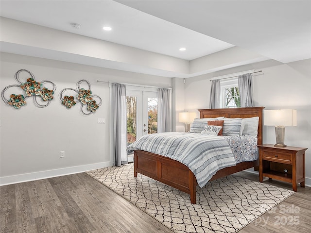 bedroom with access to outside, baseboards, recessed lighting, and wood finished floors