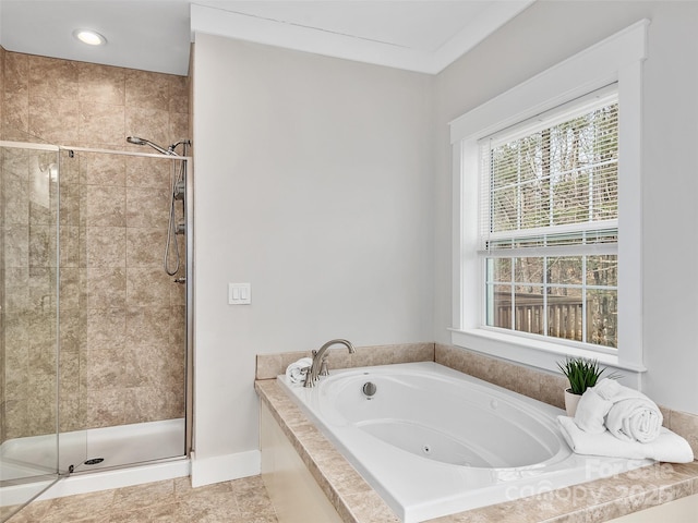 bathroom with a tub with jets, recessed lighting, tile patterned floors, and a shower stall