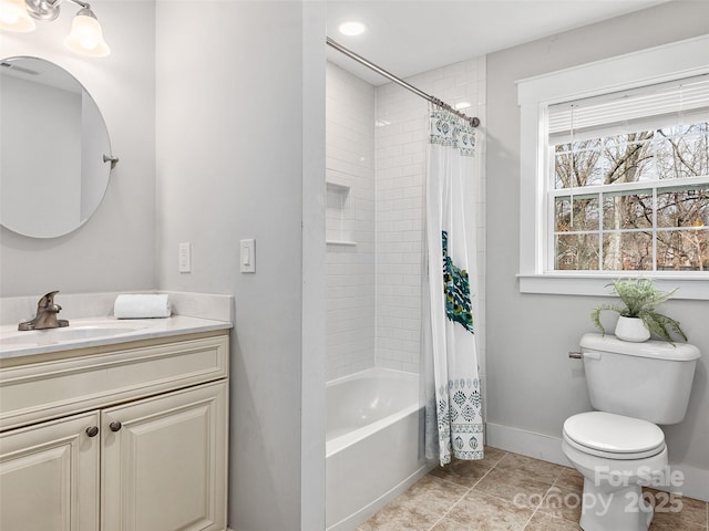 full bathroom featuring shower / tub combo with curtain, vanity, toilet, baseboards, and visible vents
