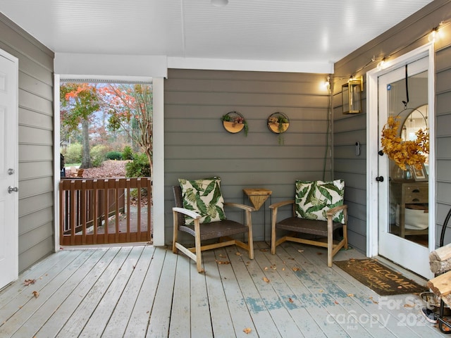 deck with covered porch