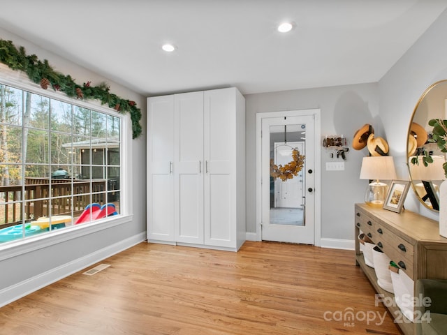 entrance foyer featuring light hardwood / wood-style floors