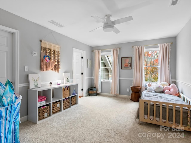 bedroom featuring ceiling fan and carpet floors