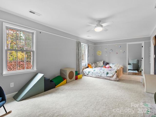 3 White Rock Ct, Arden, NC 28704 - carpeted bedroom with multiple windows, ornamental molding, and a ceiling fan