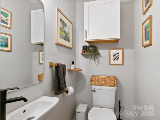 3 White Rock Ct, Arden, NC 28704 - bathroom featuring a sink and toilet