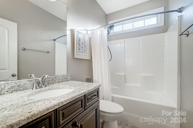 full bathroom featuring vanity, toilet, and shower / bath combo with shower curtain