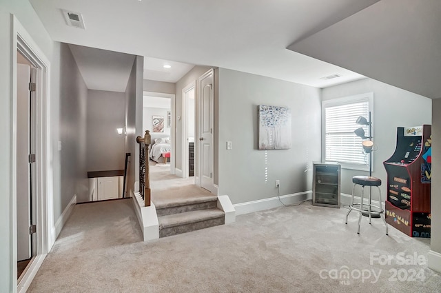 interior space with light colored carpet